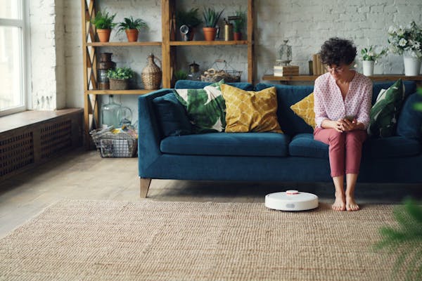 Stress Free - Woman relaxing while home is cleaned